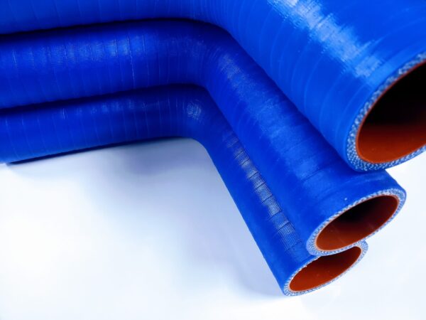 A close up of three blue hoses on top of each other.